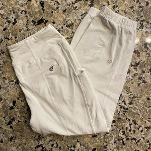 White Lululemon capri joggers with cuffed bottoms!